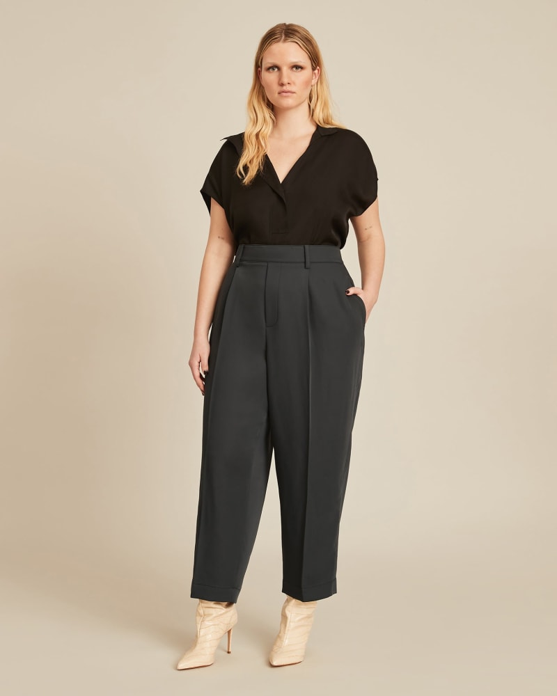 Front of a model wearing a size 2X Tapered Pull On Pant in NAVY by Vince. | dia_product_style_image_id:227310